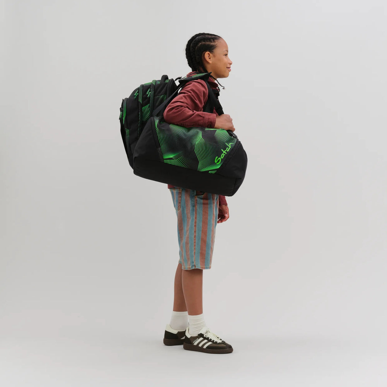 Zaino Satch Match Plus Seismic Green indossato - dettaglio