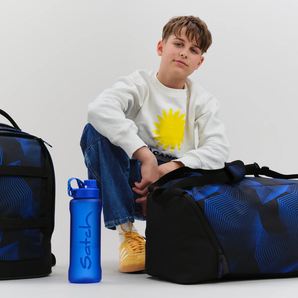 Zaino Satch Pack Seismic Blue indossato - vista laterale